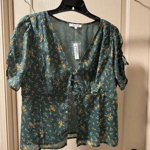 Madewell blouse just in time for spring weather. New with tags & extra button.